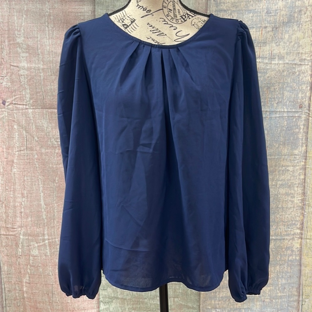 Good used condition Woman’s SHEIN top. Size is medium.